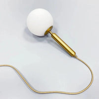 Suspension Luxe Laiton Noir Boule LED | Marco Lucetti