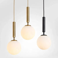 Suspension Luxe Laiton Noir Boule LED | Marco Lucetti
