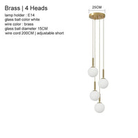 Suspension Luxe Laiton Noir Boule LED | Marco Lucetti Laiton 4 têtes / Blanc chaud 3000K