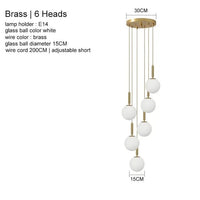Suspension Luxe Laiton Noir Boule LED | Marco Lucetti Laiton 6 têtes / Blanc chaud 3000K
