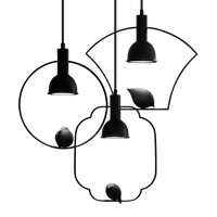 Suspension métallique avec pendentif en forme d'oiseau | Marco Lucetti