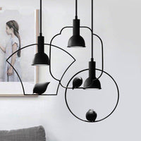 Suspension métallique avec pendentif en forme d'oiseau | Marco Lucetti