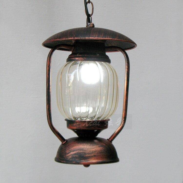 Suspension rétro LED en métal et verre arrondi | Marco Lucetti