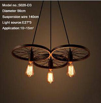 Suspension Rustique "Roue Antique" | Marco Lucetti 3 lampes