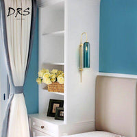 Tube en verre et base dorée pour un maquillage de luxe | Marco Lucetti